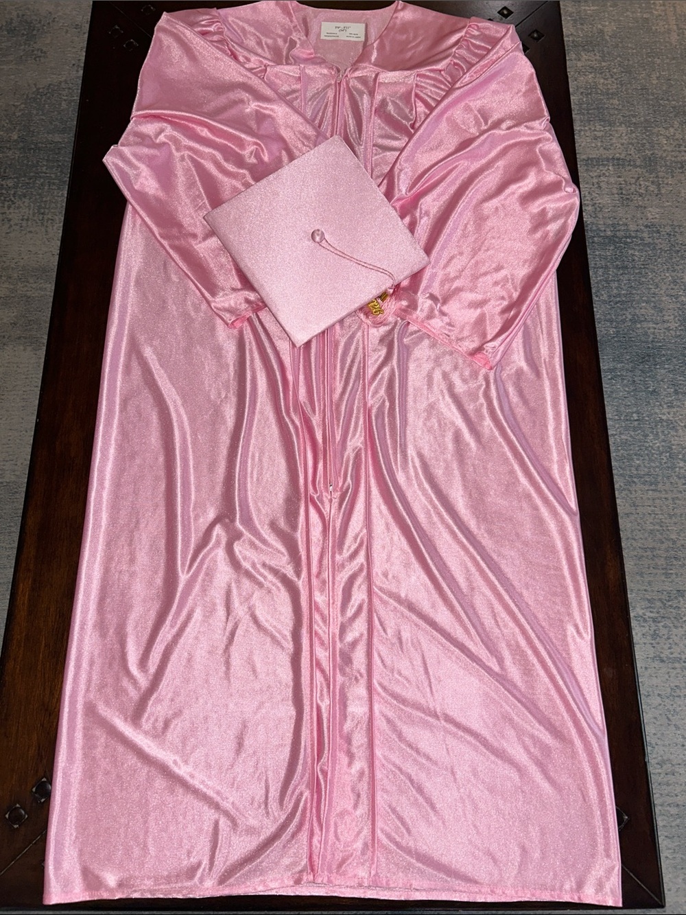 Pink Graduation Cap and Gown